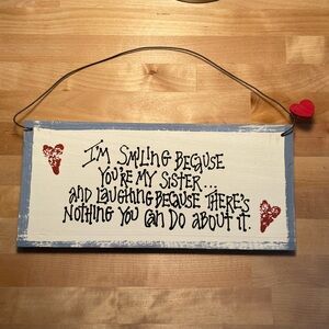 Wooden distressed painted sign